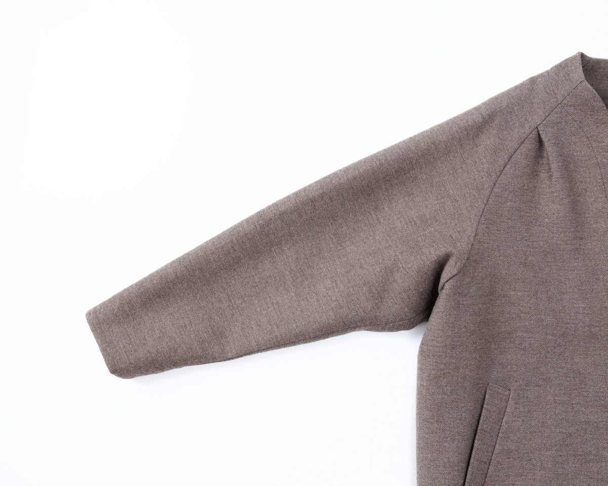 Taupe-brown coat on a white background