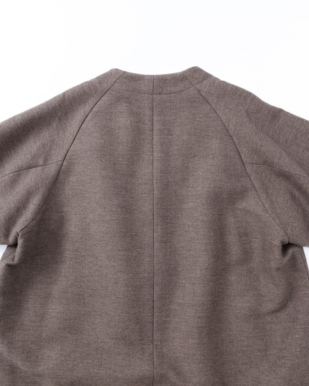 Taupe-brown coat on a white background