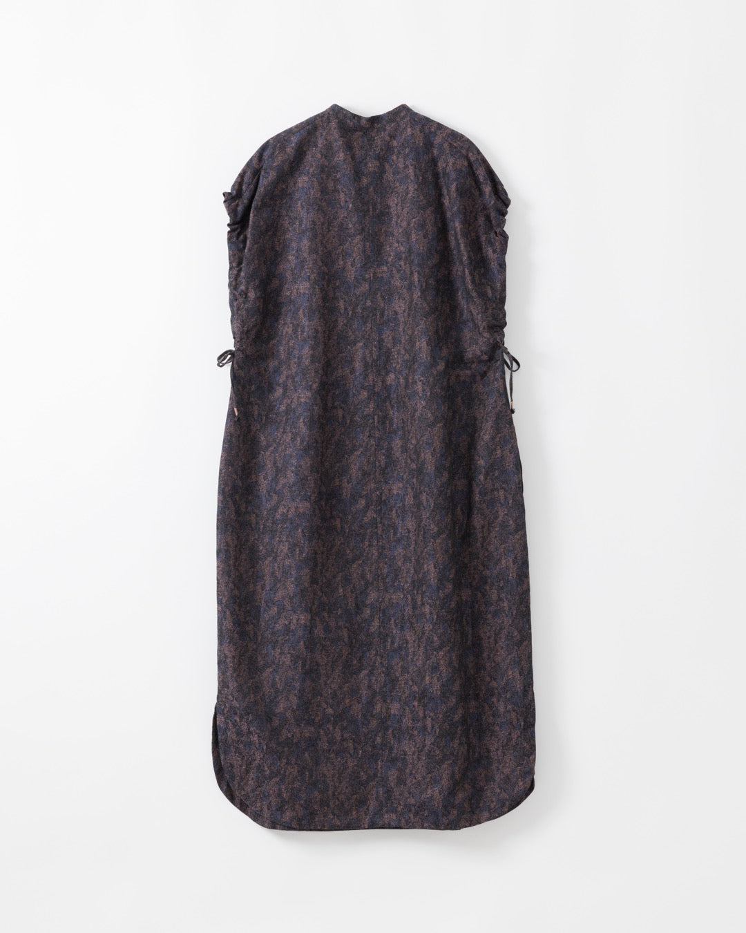 Dark patterned dress on a white background