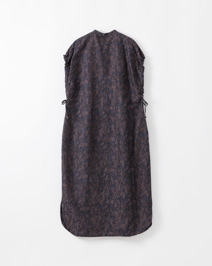 Dark patterned dress on a white background