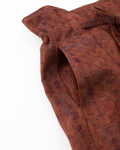 Close-up of a red textured fabric with a white background