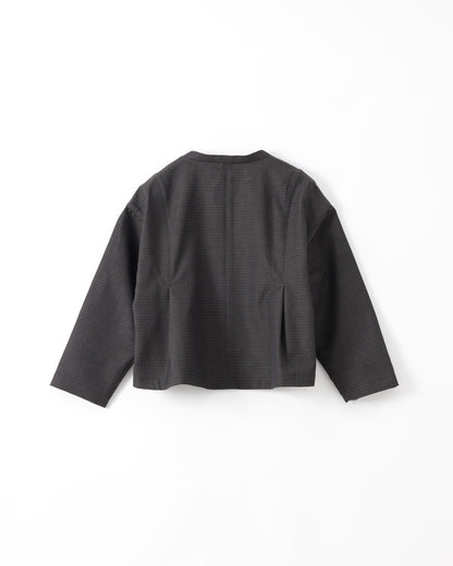 A black textured long-sleeve cropped jacket shown from the back, laid flat against a clean white background.