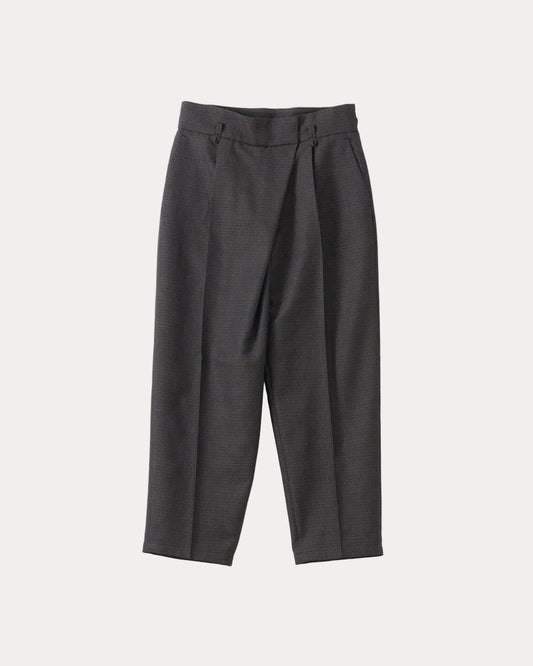 A pair of black pleated trousers shown flat against a solid white background.