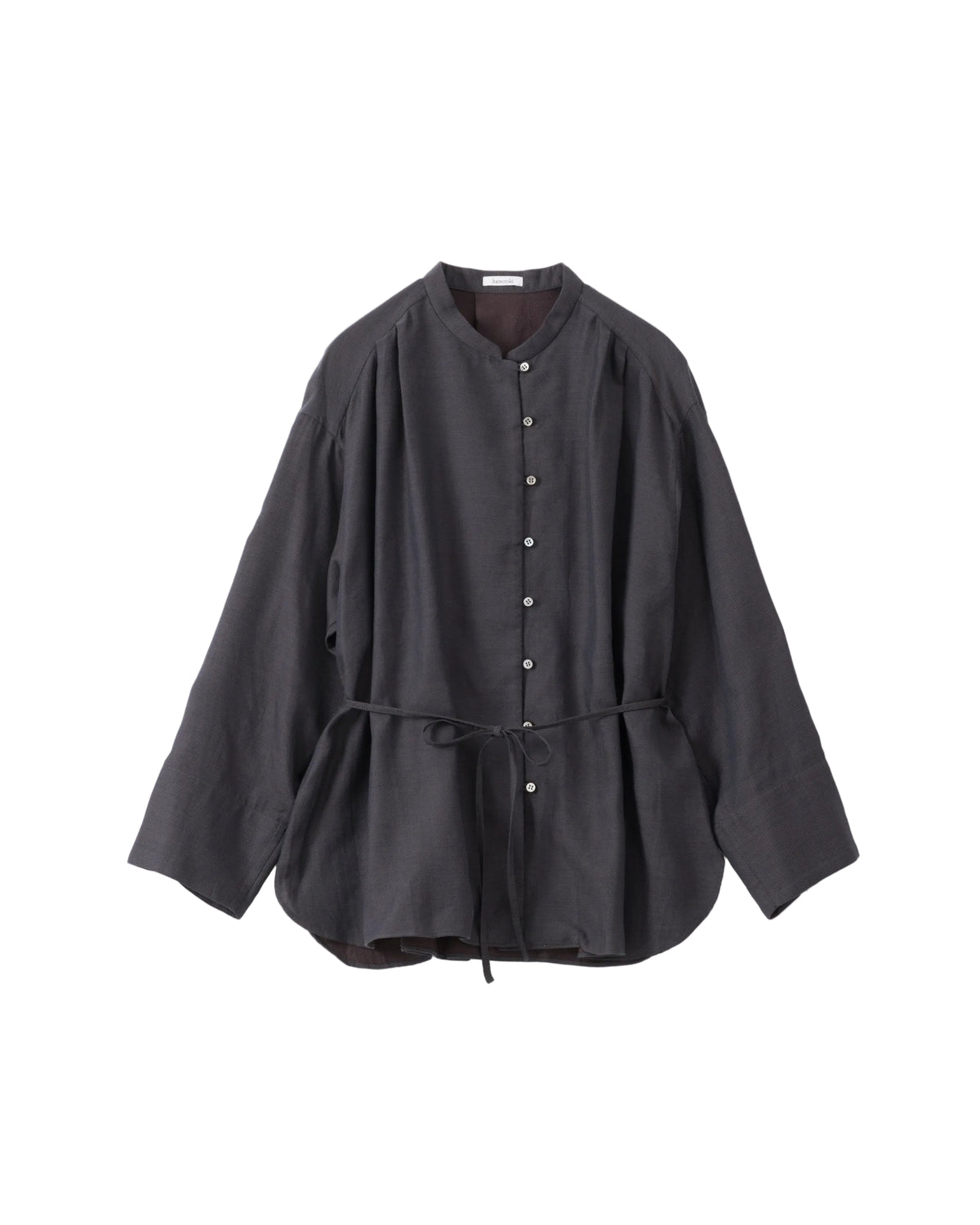 Black blouse with a belt on a white background