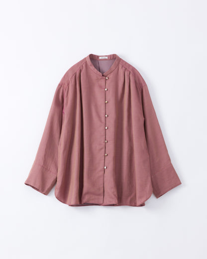 Pink cotton blouse on a light grey background