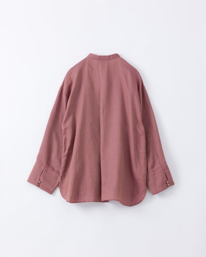 Pink blouse on a white background