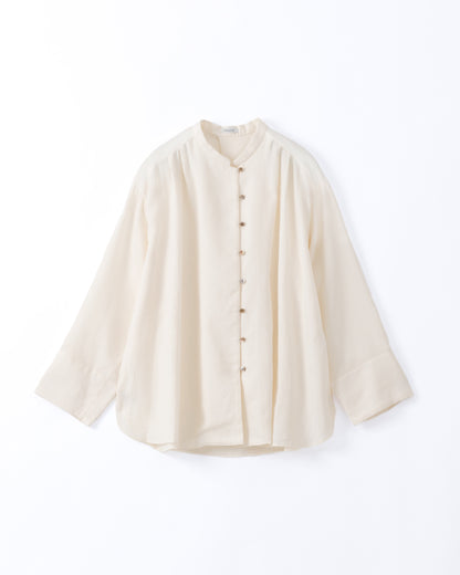 An off-white long-sleeve cotton shirt displayed against a white background.