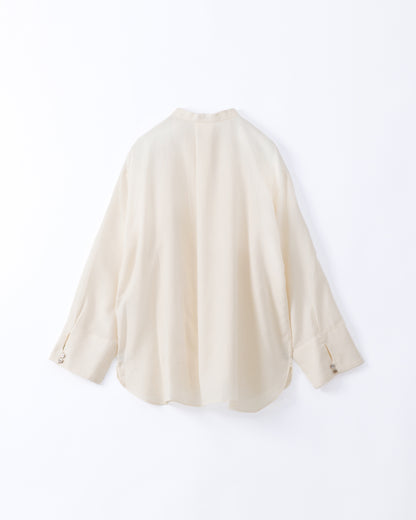 An off-white long-sleeve cotton shirt displayed against a white background.
