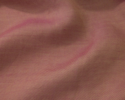 Close up of a dark pink textured fabric