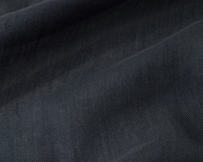 Close up of a navy textured fabric