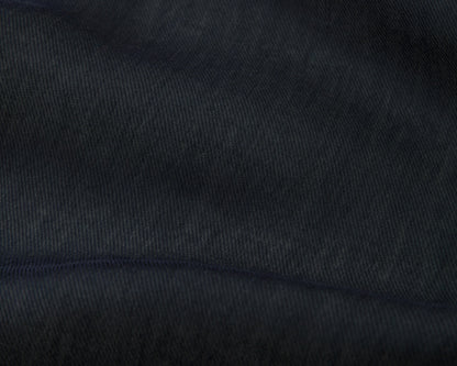 Close up of a navy textured fabric