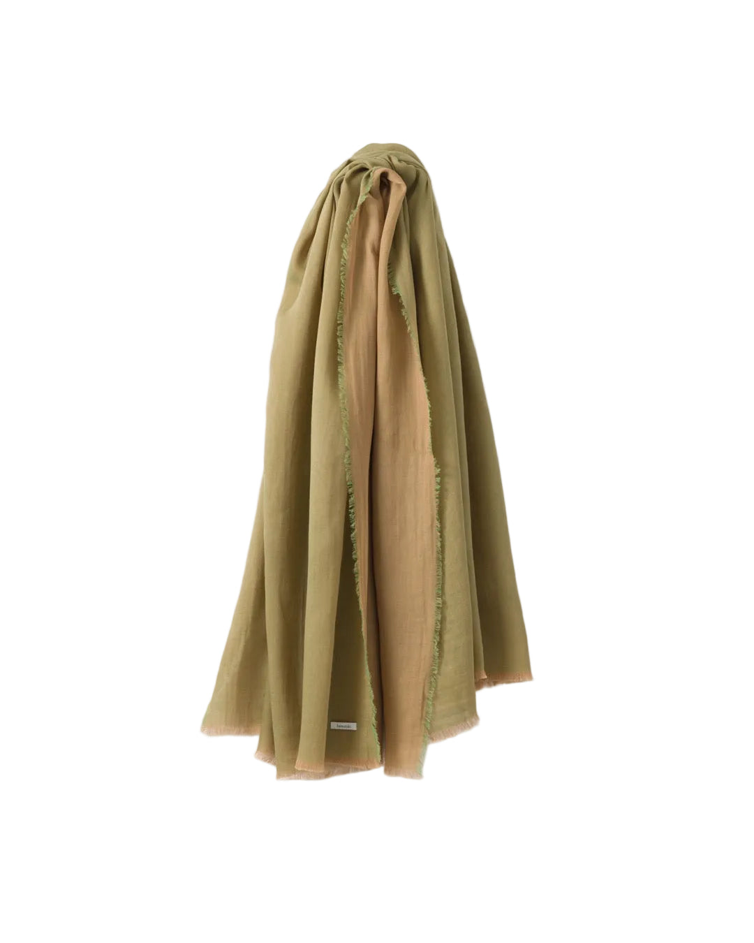 Pistachio green and brown scarf draped over a white surface.