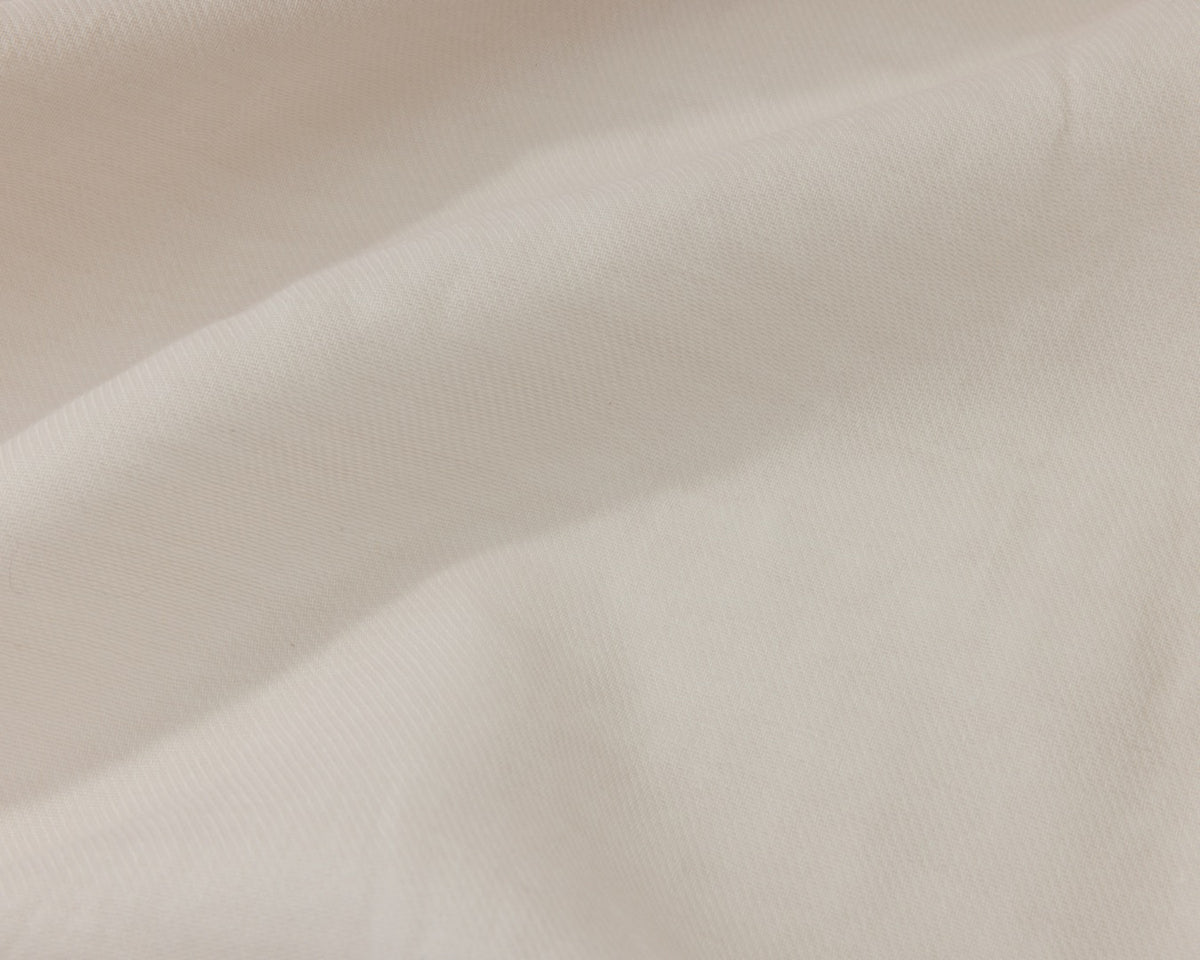Close up of a white textured fabric