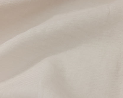Close up of a white textured fabric