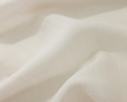 Close up of a white textured fabric