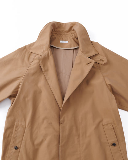 Tan car coat, partially open, on a white background