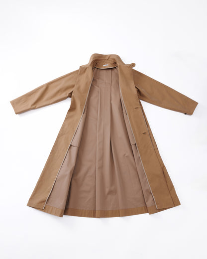 Beige coat on a white background