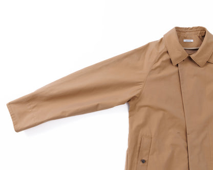 Beige-coat on a white background