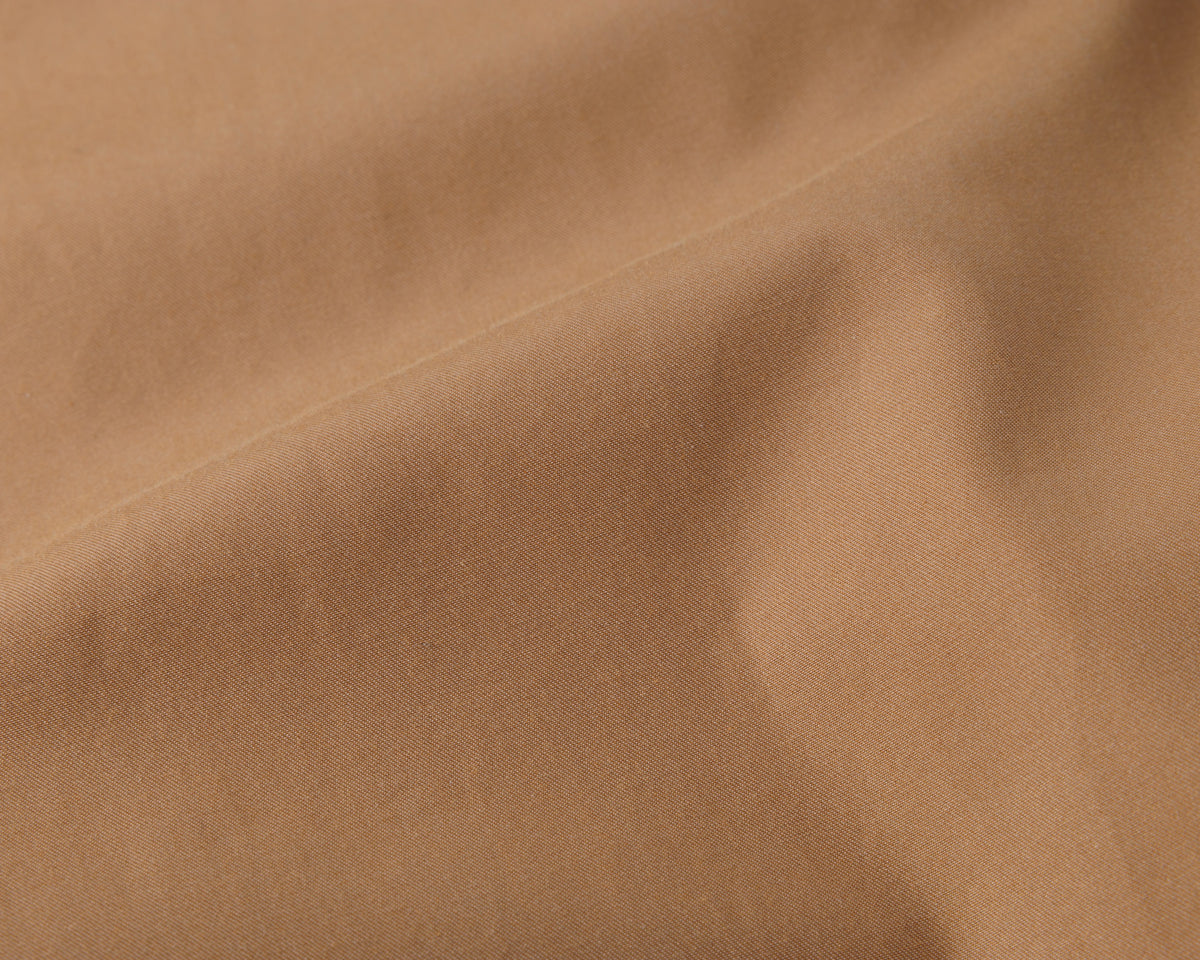 Close-up of beige fabric texture