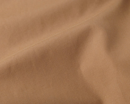 Close-up of beige fabric texture
